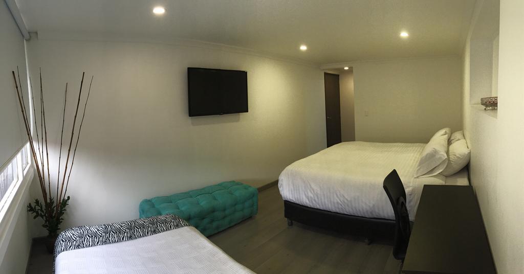 Hotel Metro 26 Bogotá Szoba fotó